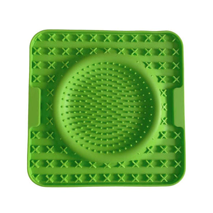 Green silicone dog lick mat with raised textures for enrichment and mental stimulation by Paws In Earnest